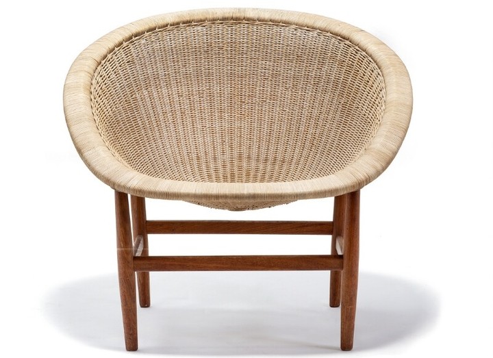 Nanna Ditzel: Easy chair with teak frame mounted on tapering legs. Seat, back and sides of woven cane. Made by cabinetmaker Ludvig Pontoppidan.