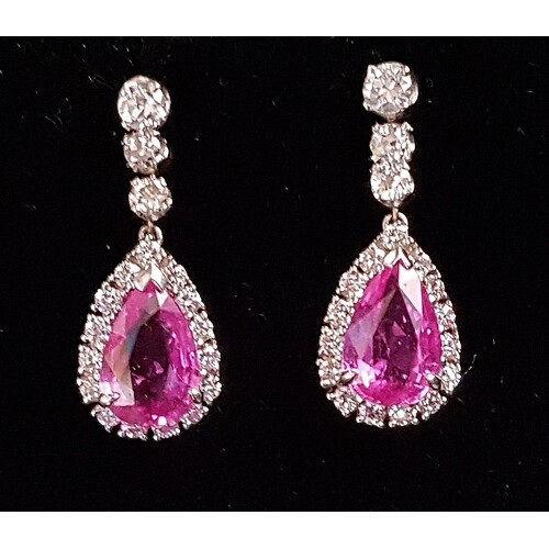 PAIR OF PINK TOPAZ AND DIAMOND DROP EARRINGS the central pea...