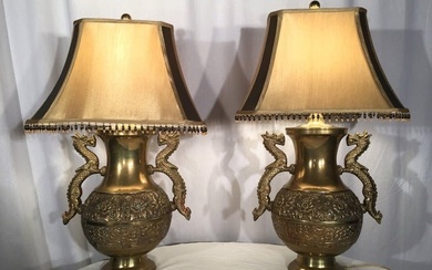 Pair of Asian Inspired Brass Repoussé Dragon Lamps