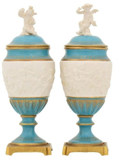 Pair of French Bisque & Porcelain Urns