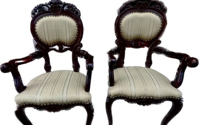 Pair of French rosewood arm chairs