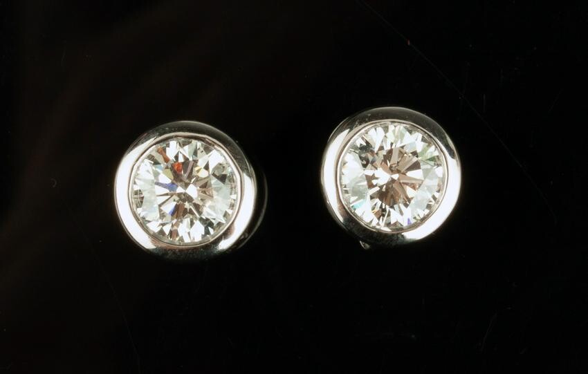Pair of 14k White Gold Round Cut Diamond Earrings
