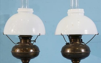 Pair of antique oil lamps with white shades, electrified, 21 in. T.