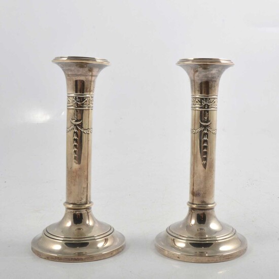 Pair of silver candlesticks in the Adam style, Levi & Salaman, Birmingham 1927.