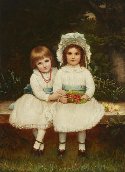 Portrait of two young girls sitting in the garden