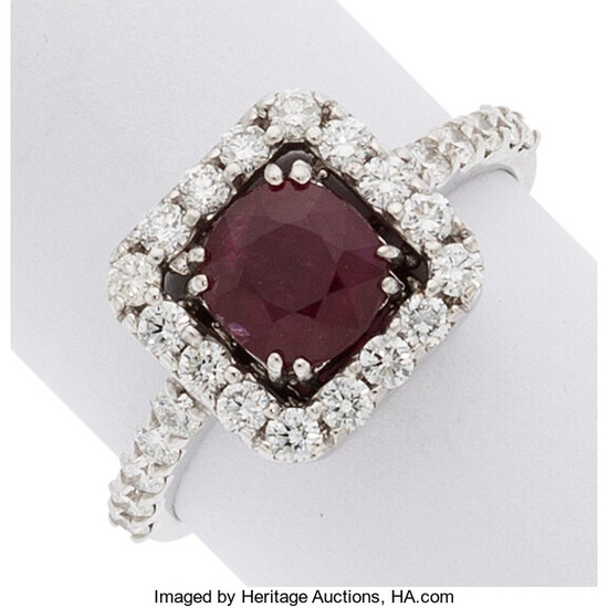 Ruby, Diamond, White Gold Ring The ring features an...
