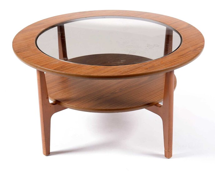 Schreiber: teak veneered and glass circular coffee table.