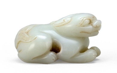 PURE WHITE RIVER PEBBLE JADE CARVING OF A...