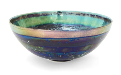Sutton Taylor, b.1943, a green and blue thrown earthenware bowl, 2002, decorated with reduction fired copper and platinum lustres, with impressed 'ST' monogram seal, 15cm high, 36.5cm diameter ARR Provenance: with Hart Gallery, London, May 2002...