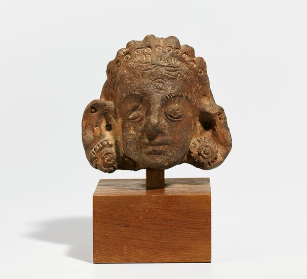 Terracotta head with hair jewels and ear flower
