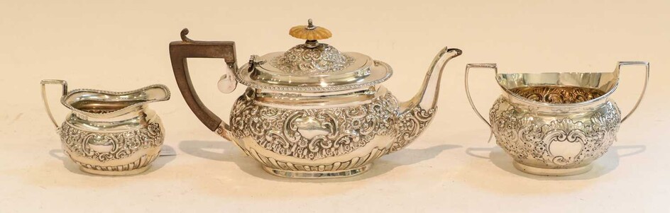 A George V Silver Teapot and Cream-Jug with an...