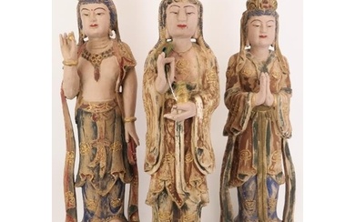 Three Chinese gilt and lacquer painted carved wood figural i...