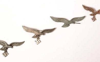 Three WWII German Luftwaffe breast badges and a repro cap badge