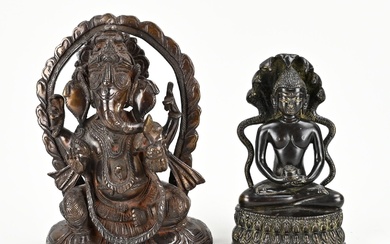 Two Oriental bronze Buddha figures. 1x Geisha. 1x Figure in lotus position. 20th century. Size:...