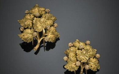 Two yellow chased gold leaf and blackberry brooches, in