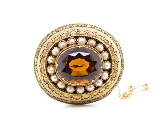 Victorian yellow gold Etruscan style brooch set with large r...
