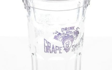 Vintage pressed glass Straw Holder advertising "Drink Grape Smash" with folding silver lid, measures