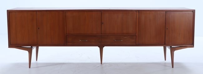 WALNUT SIX DOOR SIDEBOARD WITH ANGLED LEGS IN THE MANNER OF ICO PARISI C 1950.