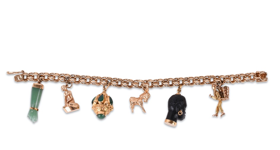 14K YELLOW GOLD CHARM BRACELET WITH 14K AND 18K CHARMS Length: 6 3/4 in. (x 17.1 cm.)
