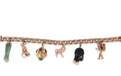 14K YELLOW GOLD CHARM BRACELET WITH 14K AND 18K CHARMS Length: 6 3/4 in. (x 17.1 cm.)