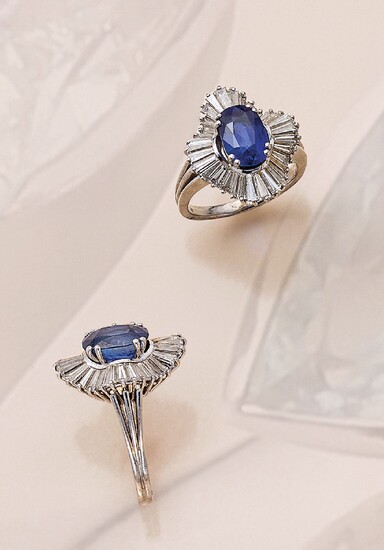 18 kt gold ring with sapphire and diamonds...