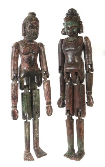 2 jointed dolls southeast asia, 20th century, wood, colourful painted, 1x monkey god Humanum, 1x gentleman with topknot and beard, h: 110/115 cm. Signs of age, dry cracks.