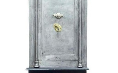 19TH CENTURY POLISHED STEEL SAFE ON STAND