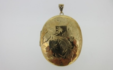 A 9ct gold engraved locket