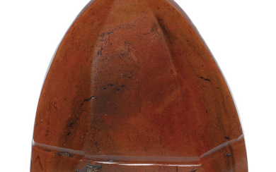 A FACETTED AND DOMED RED JASPER IMPLEMENT, NEAR MIDDLE EAST OR INDIA, 9TH-14TH CENTURY OR LATER