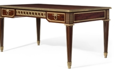 A FRENCH ORMOLU-MOUNTED KINGWOOD, TULIPWOOD AND HAREWOOD PARQUETRY BUREAU PLAT, AFTER THE MODEL BY JEAN-FRANÇOIS OEBEN, BY MAISON JANSEN, PARIS, LATE 19TH/EARLY 20TH CENTURY