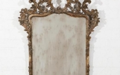 An Italian Rococo style silvered mirror