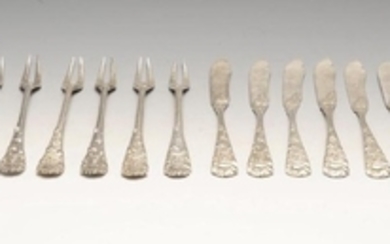 A set of Japanese silver pastry knives and forks