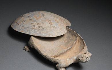 A tortoise-shaped pottery ink-stone and cover