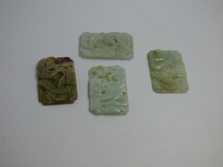 4 Oriental carved jade plaques each 4.5x3 cm (4)