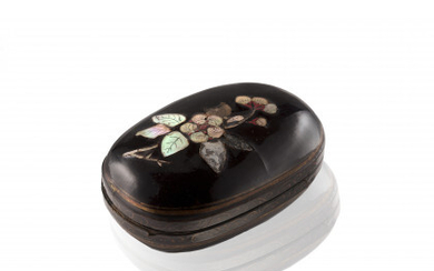 A black inlaid (luotian) and gold-painted (miaojin) oval lacquer box and cover, the cover with mother-of-pearl inlaid decoration depicting a...