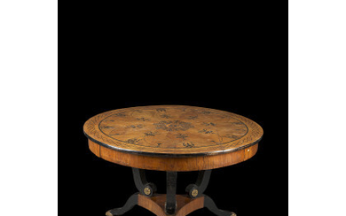 A mahogany round table with inlaid top (d. cm 117, h. cm 76) 19th century (defects and losses)