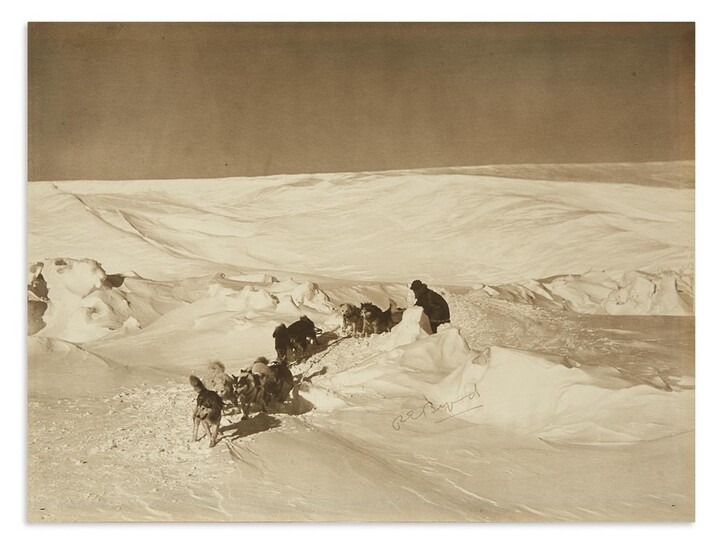 BYRD, RICHARD E. Large Photograph Signed, "REByrd," showing him with his dogsled on...