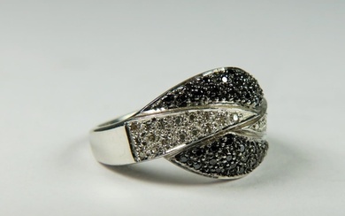 9ct White Gold Diamond Cluster ring set in a waves pattern. ...