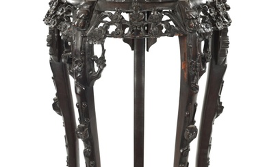 A 19TH CENTURY CHINESE CARVED HARDWOOD JARDINIERE STAND the...