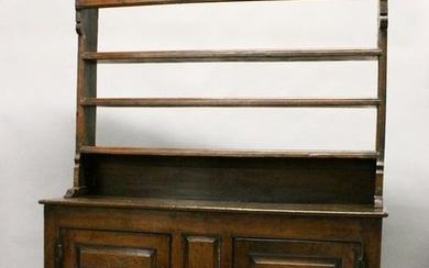 A 19TH CENTURY OAK DRESSER, with a triple Delft rack