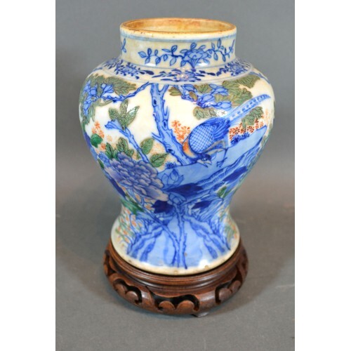 A 19th Century Chinese Porcelain Vase decorated in underglaz...