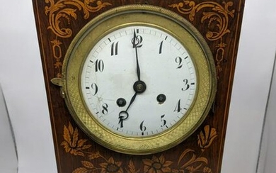 A 19th century French marquetry inlaid mantle clock