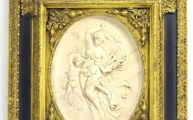 A 20thC cast relief oval plaque depicting a classical