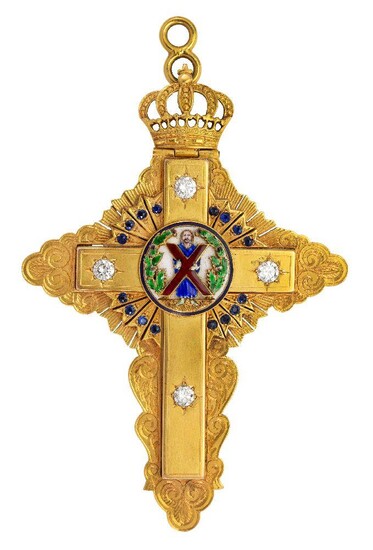 A 9ct gold, diamond and enamel, pectoral cross pendant, by Garrard & Co, the Orthodox style cross with brilliant-cut diamond single stone set arms, sapphire set sunburst and central roundel depicting the figure of Christ bearing the cross, in...
