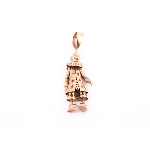 A 9ct yellow gold diamond and ruby set clown pendant, with l...