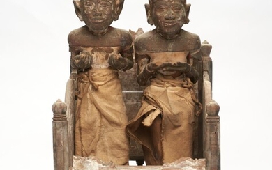 A BALINESE CARVED WOODEN FIGURAL GROUP 19TH/EARLY 20TH CENTURY