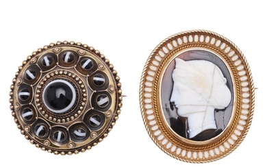 A BANDED AGATE AND GOLD BROOCH. of circular form, mounted wi...