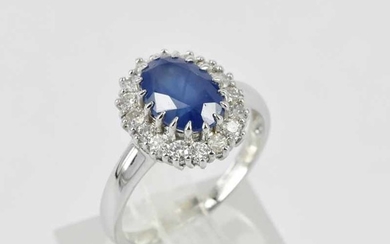 A BLUE SAPPHIRE AND DIAMOND DRESS RING