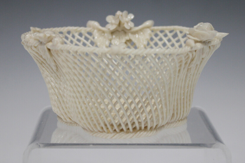 A Belleek three-strand Shamrock basket, late 19th/early 20th century, applied with different flowers