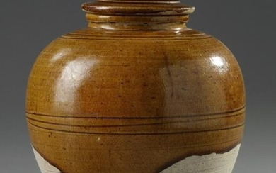 A CHINESE AMBER-GLAZED JAR AND COVER, TANG DYNASTY